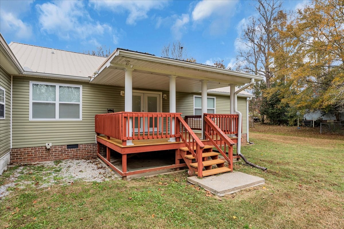 99 Arrowhead Drive Manchester, TN 37355 - Photo 33 of 39 a view of a patio with a table and chairs
