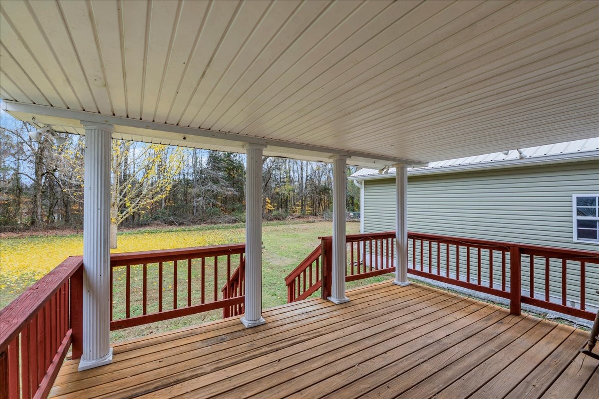 99 Arrowhead Drive Manchester, TN 37355 - Photo 35 of 39 a view of a balcony with wooden floor