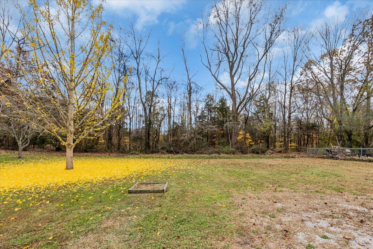 99 Arrowhead Drive Manchester, TN 37355 - Photo 37 of 39 a view of a swimming pool and trees in the background