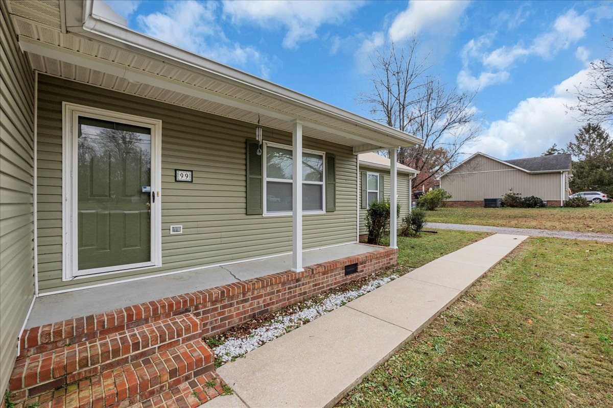 99 Arrowhead Drive Manchester, TN 37355 - Photo 4 of 39 a house with trees in front of it