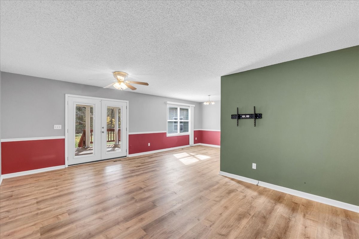 99 Arrowhead Drive Manchester, TN 37355 - Photo 10 of 39 a view of empty room with wooden floor and window