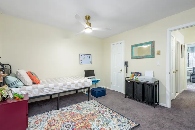 a bathroom with a sink toilet a mirror and shower