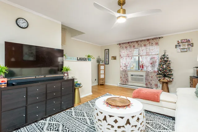 a kitchen with a stove a sink and a refrigerator
