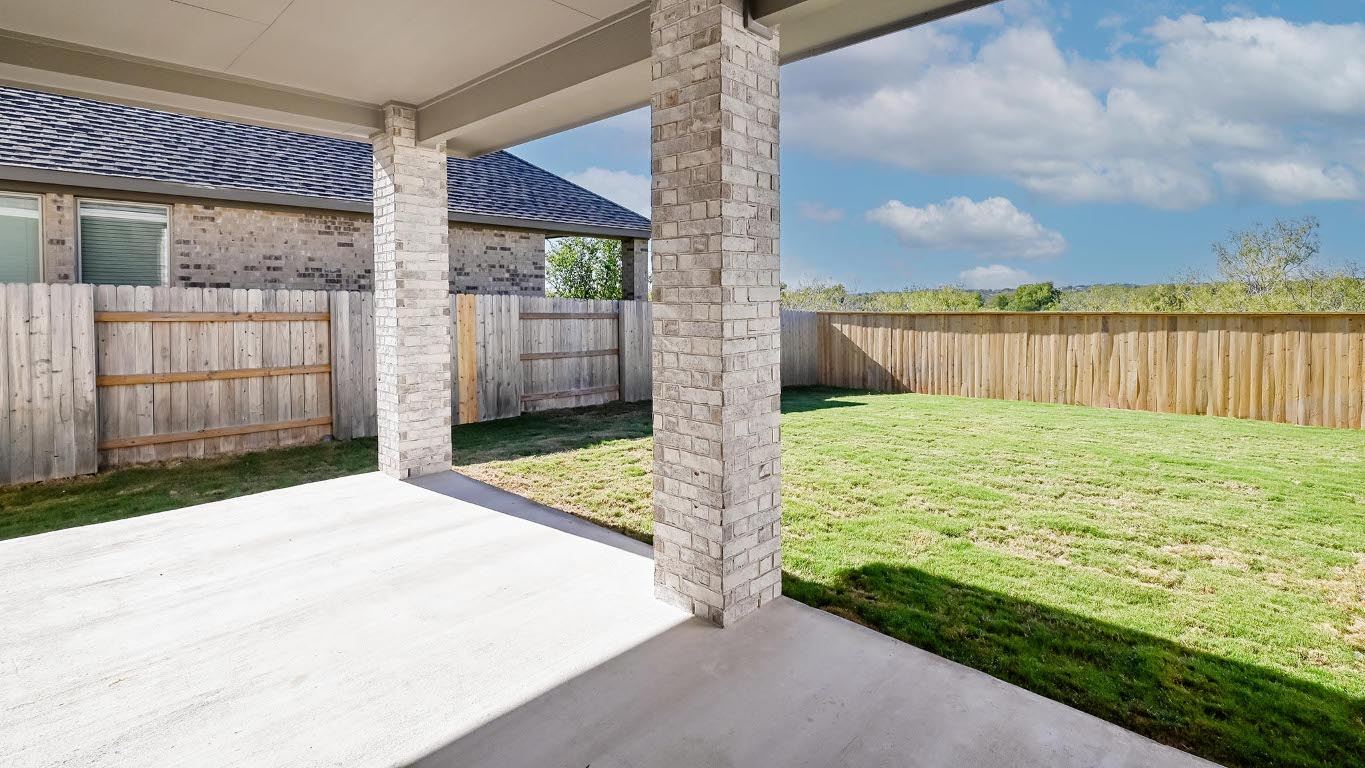 580 Bay Breeze Drive Kyle, TX 78640 - Photo 23 of 35 a view of a backyard of the house