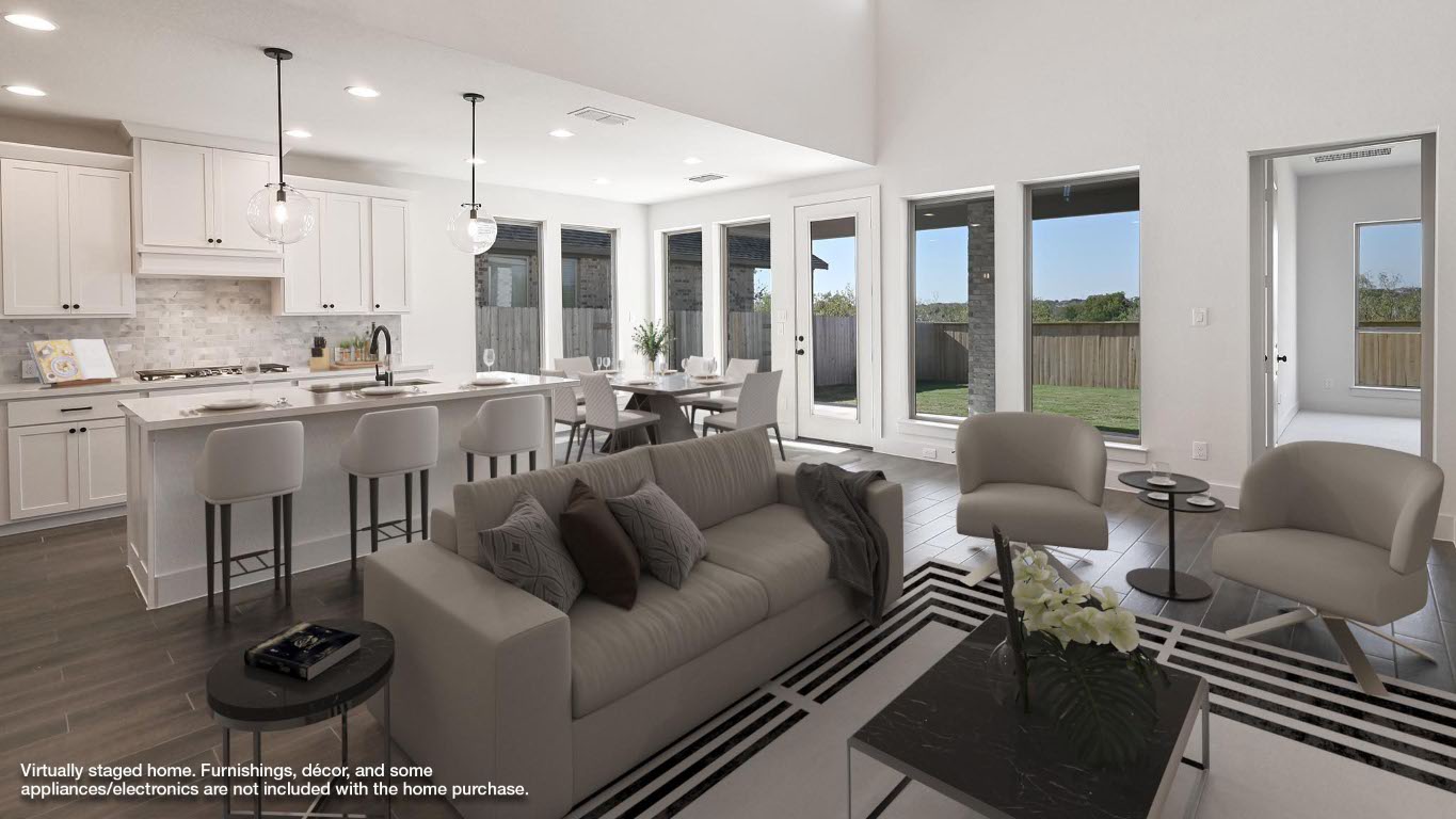 580 Bay Breeze Drive Kyle, TX 78640 - Photo 5 of 35 a living room with furniture and a large window