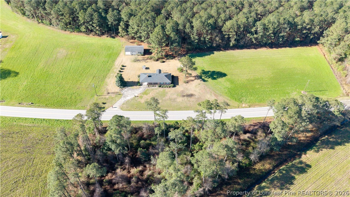 5424 Bonnetsville Road Clinton, NC 28328 - Photo 2 of 29 a view of a lake with a yard