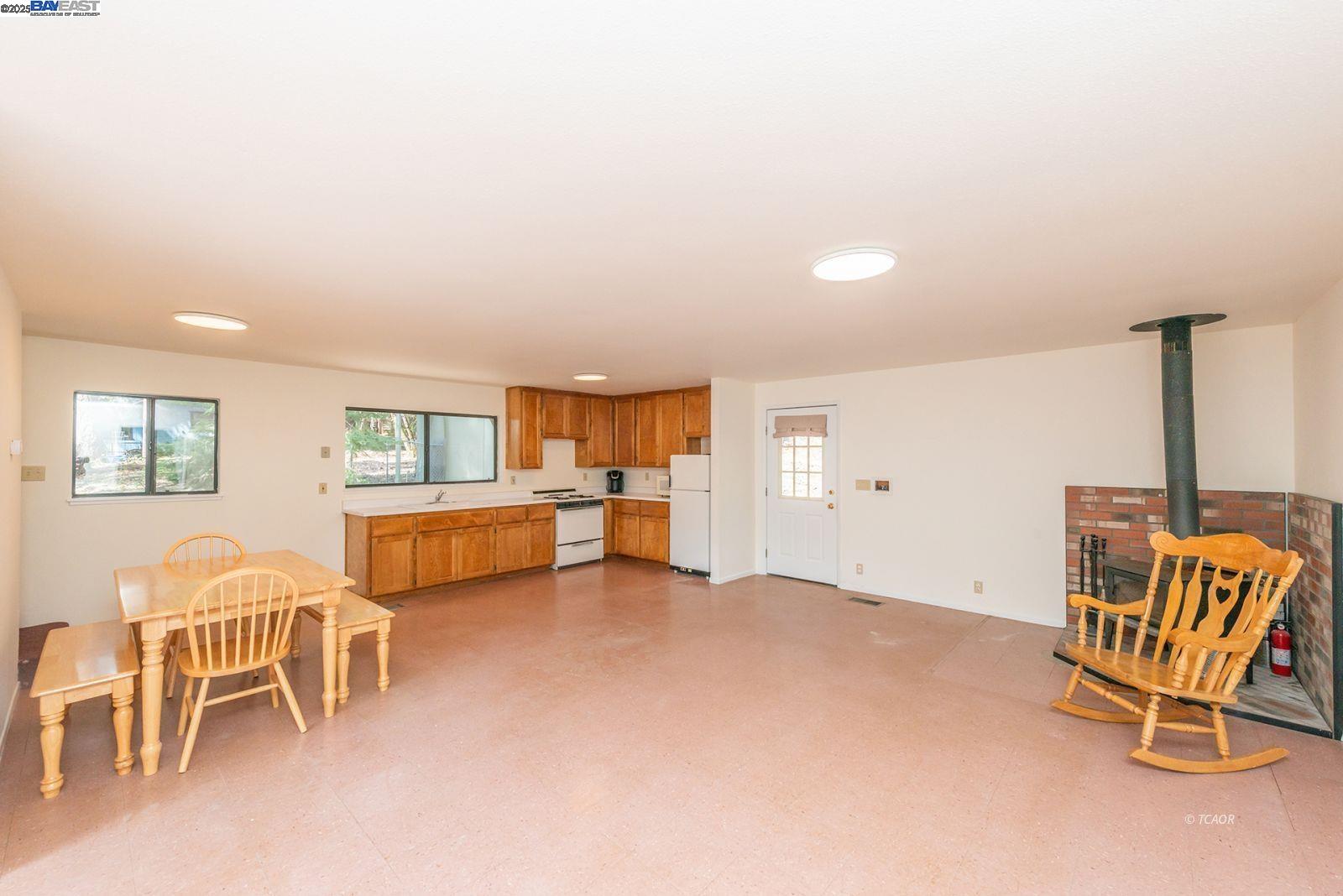 121 Mountain Aire Lane Trinity Center, CA 96091 - Photo 19 of 51 a living room with furniture and a table