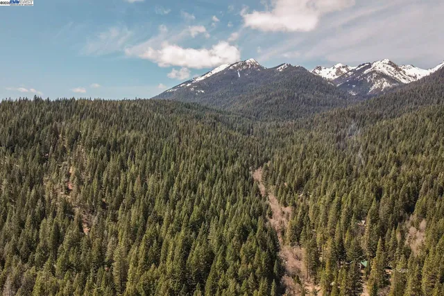 a view of mountain view with mountains in the background