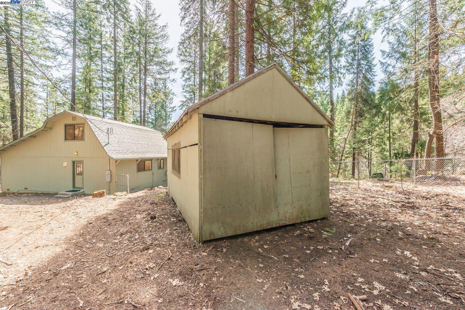121 Mountain Aire Lane Trinity Center, CA 96091 - Photo 49 of 51 a view of a house with a snow in the yard