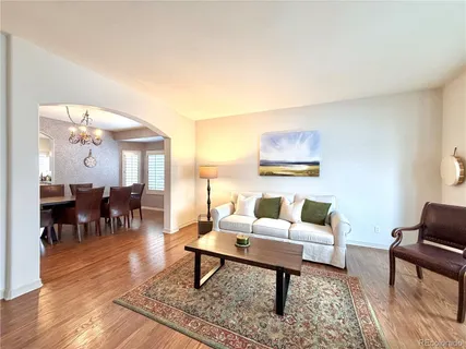 a spacious bathroom with a tub a double vanity sink and a mirror
