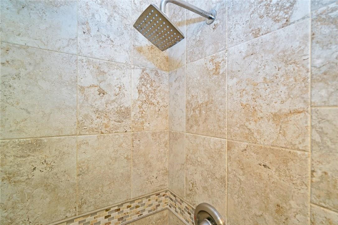 826 Jeffery Street Boca Raton, FL 33487 - Photo 30 of 41 Custom tiled walls and stone flooring.