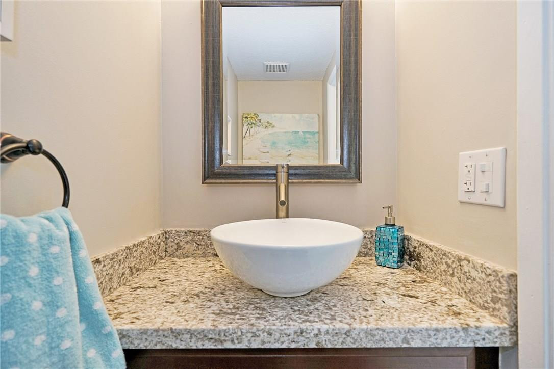 826 Jeffery Street Boca Raton, FL 33487 - Photo 5 of 41 Remodeled half bath on the first floor.