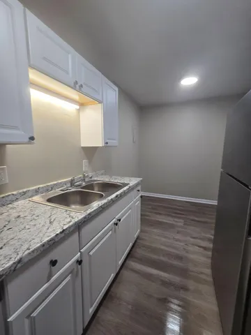 a room with a sink and a window