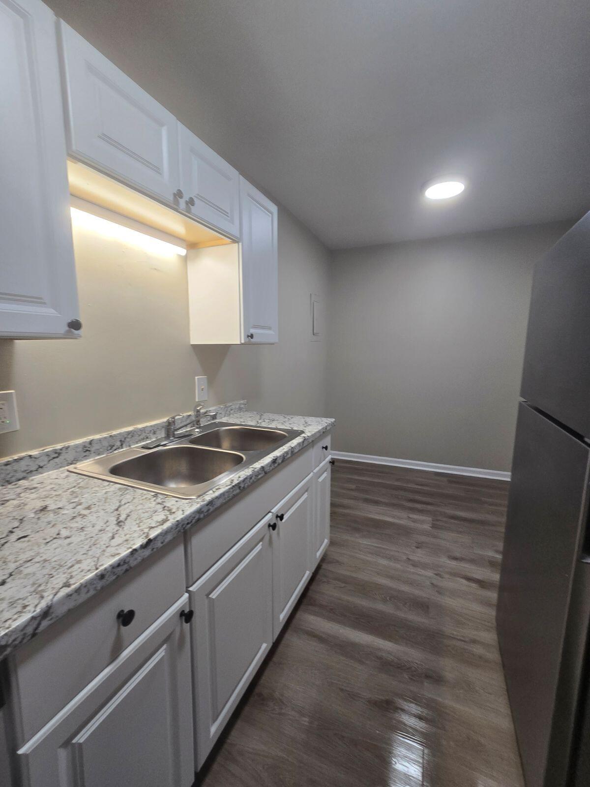 1711 Westover Avenue Southwest, Unit 12 Roanoke, VA 24015 - Photo 5 of 10 a room with a sink and a window