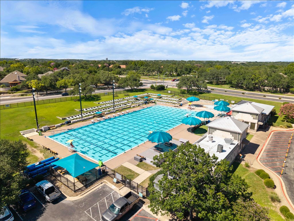 10801 Beachmont Lane Austin, TX 78739 - Photo 36 of 40 One of FOUR neighborhood pools for you to enjoy! This is the swim center with kiddie pool and tons of laps for exercise. Kids can join the Circle C Seals Swim Team for tons of fun!