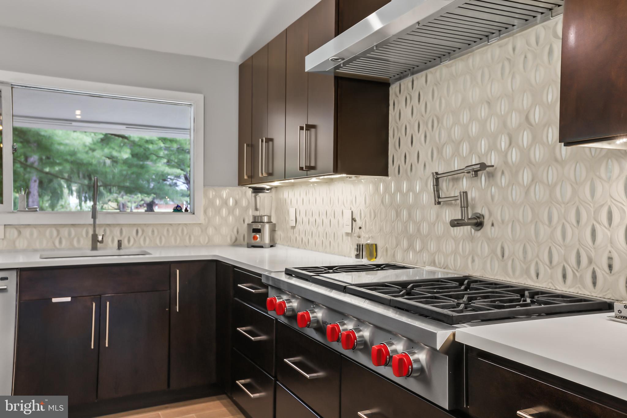 1004 Mercer Road Princeton, NJ 08540 - Photo 11 of 28 a kitchen with a stove and a sink
