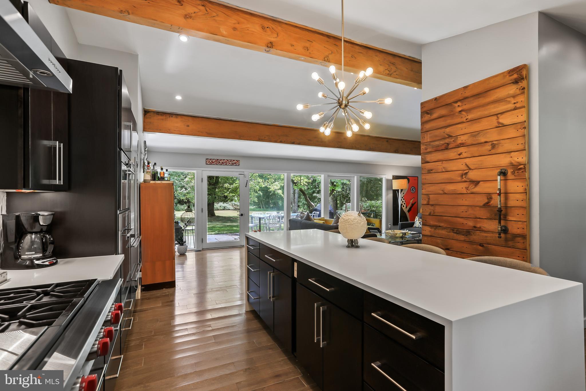 1004 Mercer Road Princeton, NJ 08540 - Photo 12 of 28 a kitchen with a stove a sink and a refrigerator