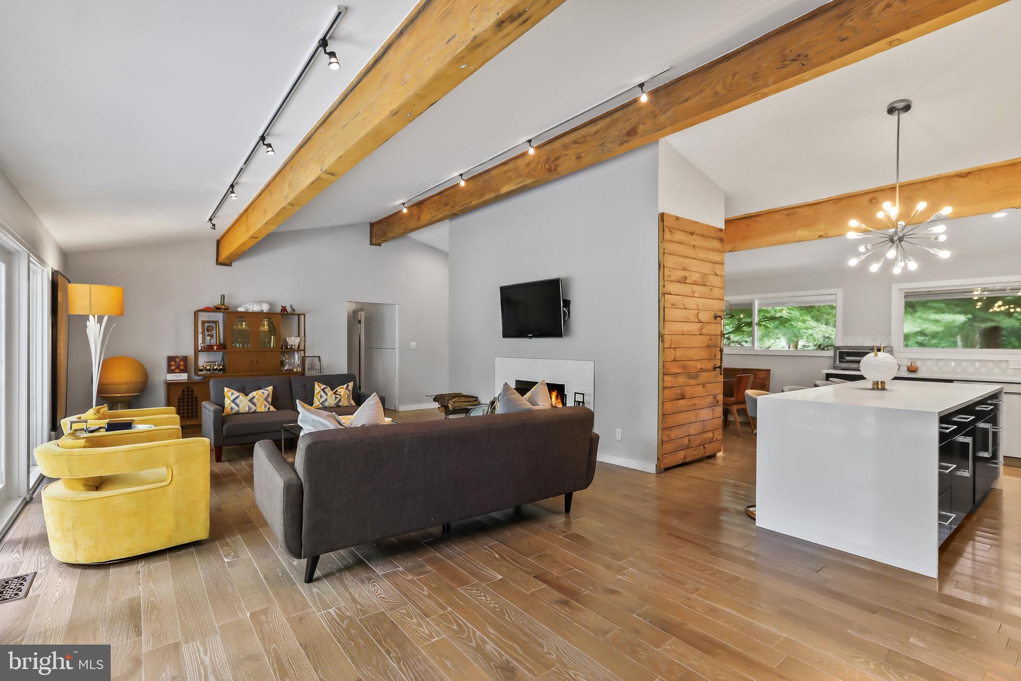1004 Mercer Road Princeton, NJ 08540 - Photo 13 of 28 a living room with furniture and a flat screen tv