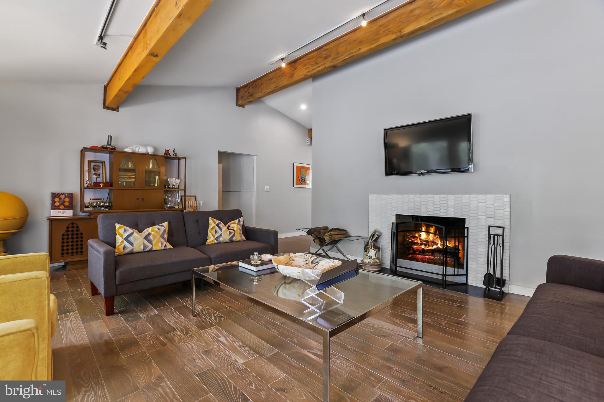 1004 Mercer Road Princeton, NJ 08540 - Photo 14 of 28 a living room with furniture and a fireplace