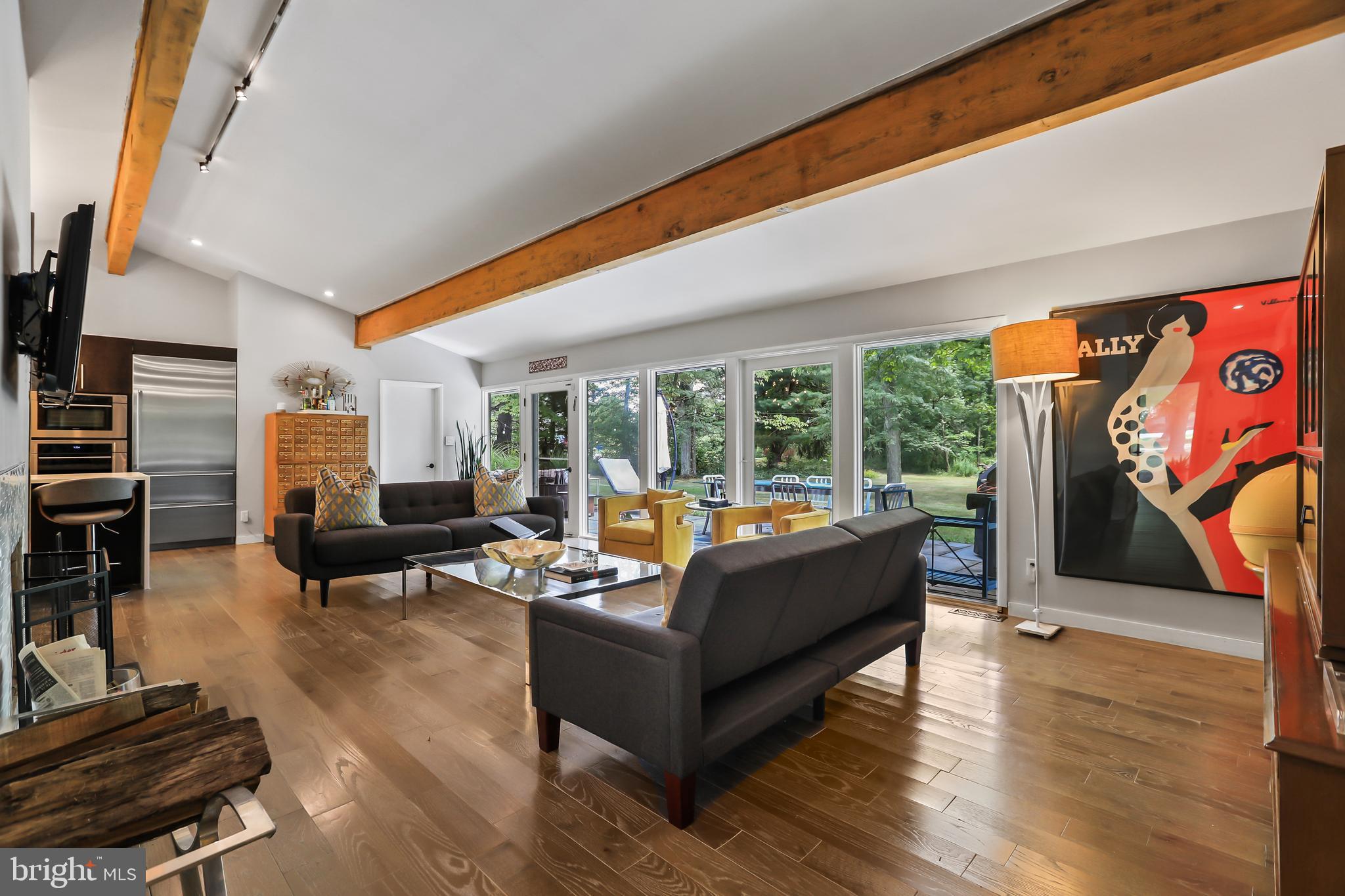 1004 Mercer Road Princeton, NJ 08540 - Photo 15 of 28 a living room with furniture fireplace and a large window