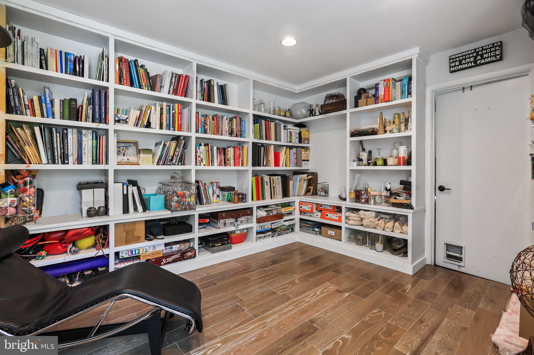 1004 Mercer Road Princeton, NJ 08540 - Photo 17 of 28 a room with furniture and a book shelf