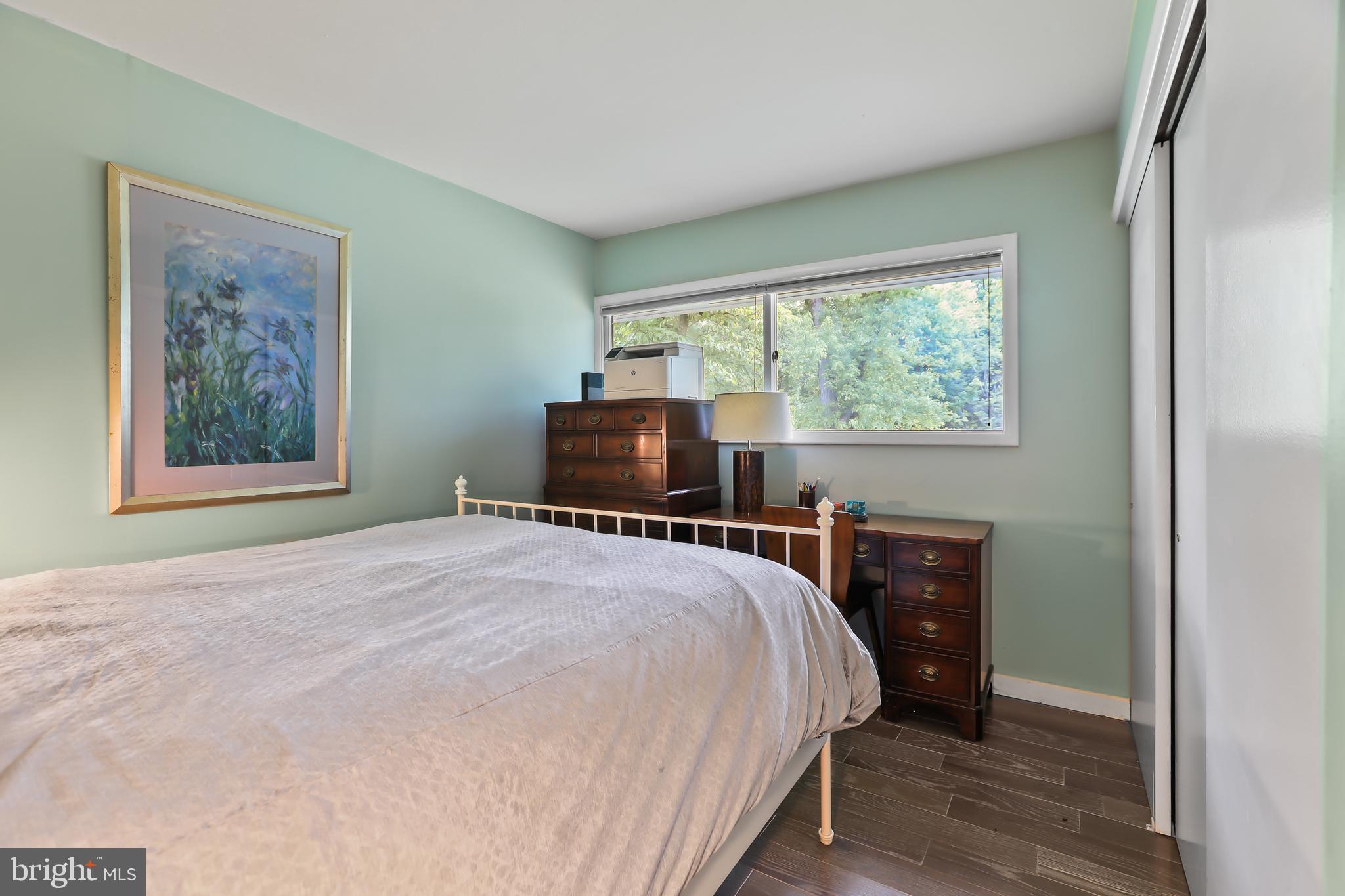 1004 Mercer Road Princeton, NJ 08540 - Photo 19 of 28 a bedroom with a bed and a large window