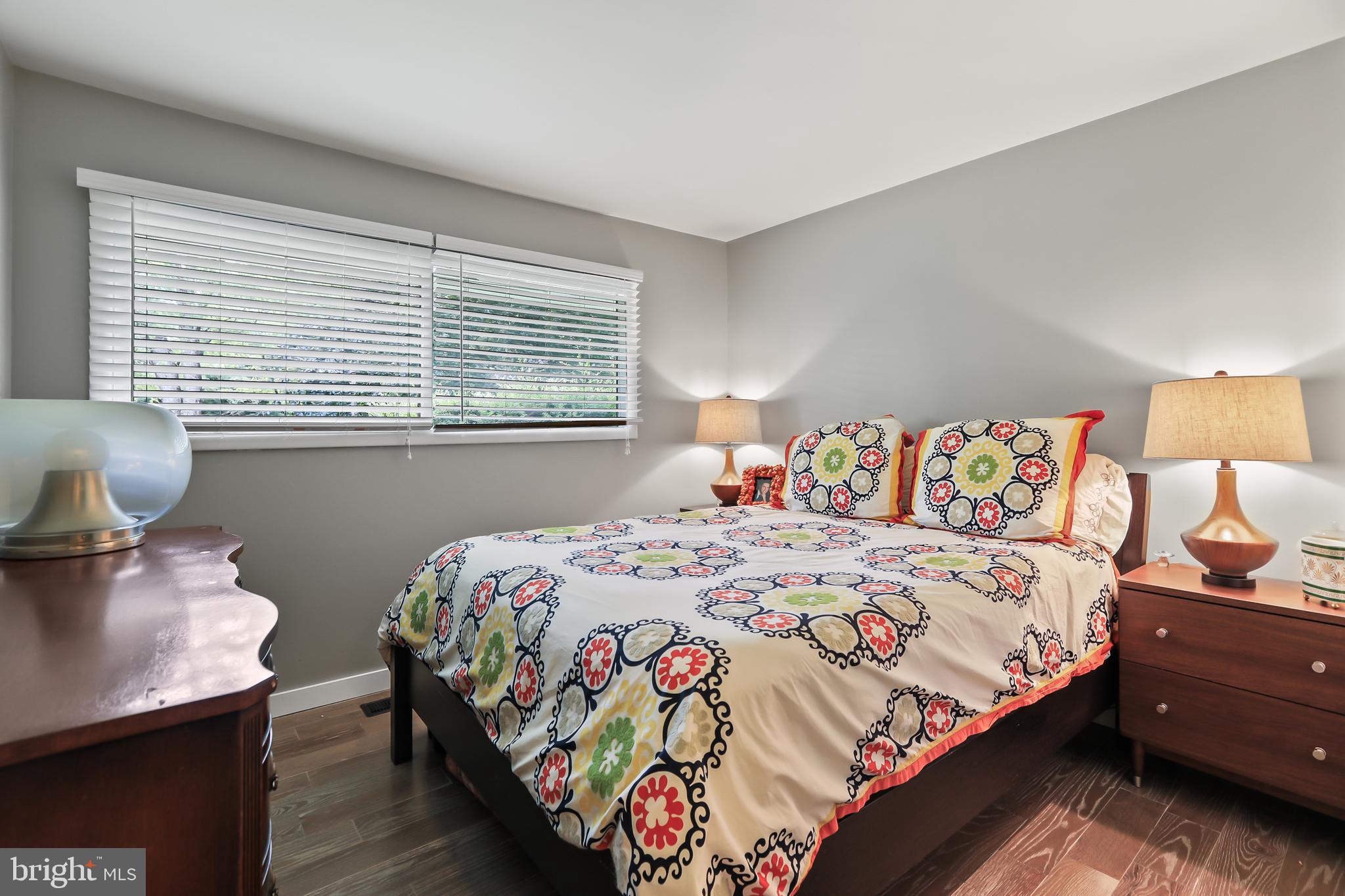 1004 Mercer Road Princeton, NJ 08540 - Photo 20 of 28 a bedroom with a bed and a table