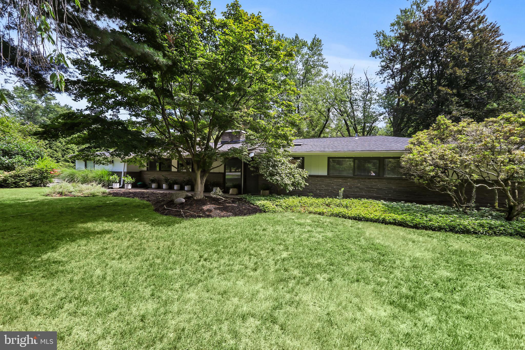 1004 Mercer Road Princeton, NJ 08540 - Photo 2 of 28 a view of a house with backyard and a tree