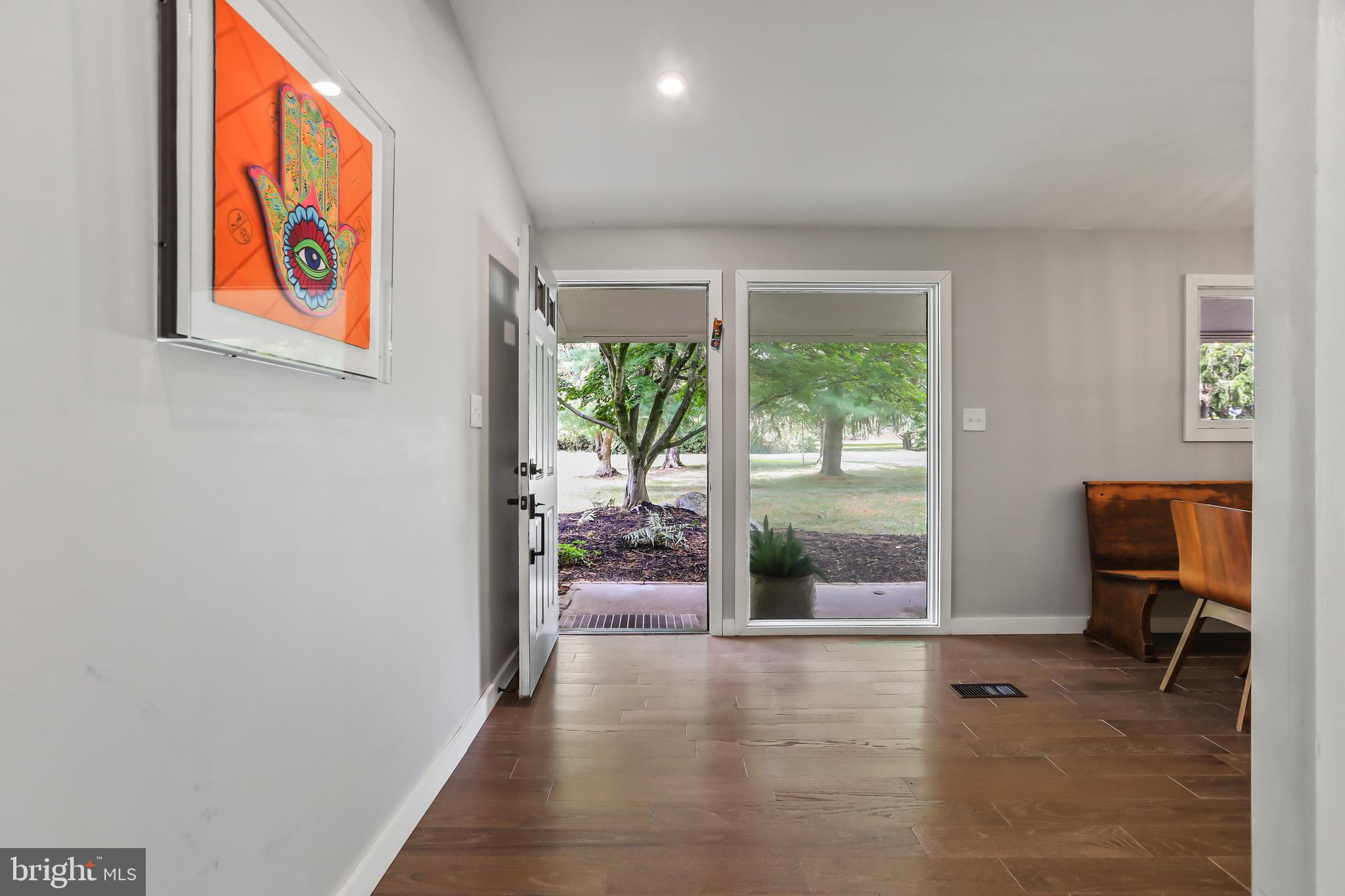 1004 Mercer Road Princeton, NJ 08540 - Photo 4 of 28 a view of an empty room with a window