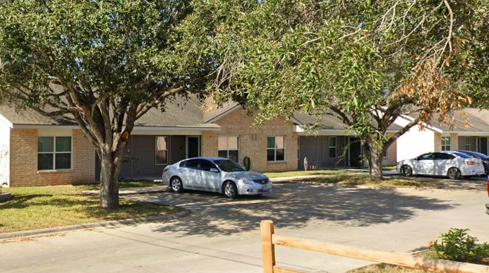 201 Springfield Road San Diego, TX 78384 - Photo 2 of 7 a front view of a house with cars parked on road