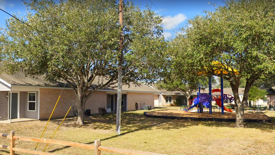 201 Springfield Road San Diego, TX 78384 - Photo 7 of 7 a view of a houses with snow on the road