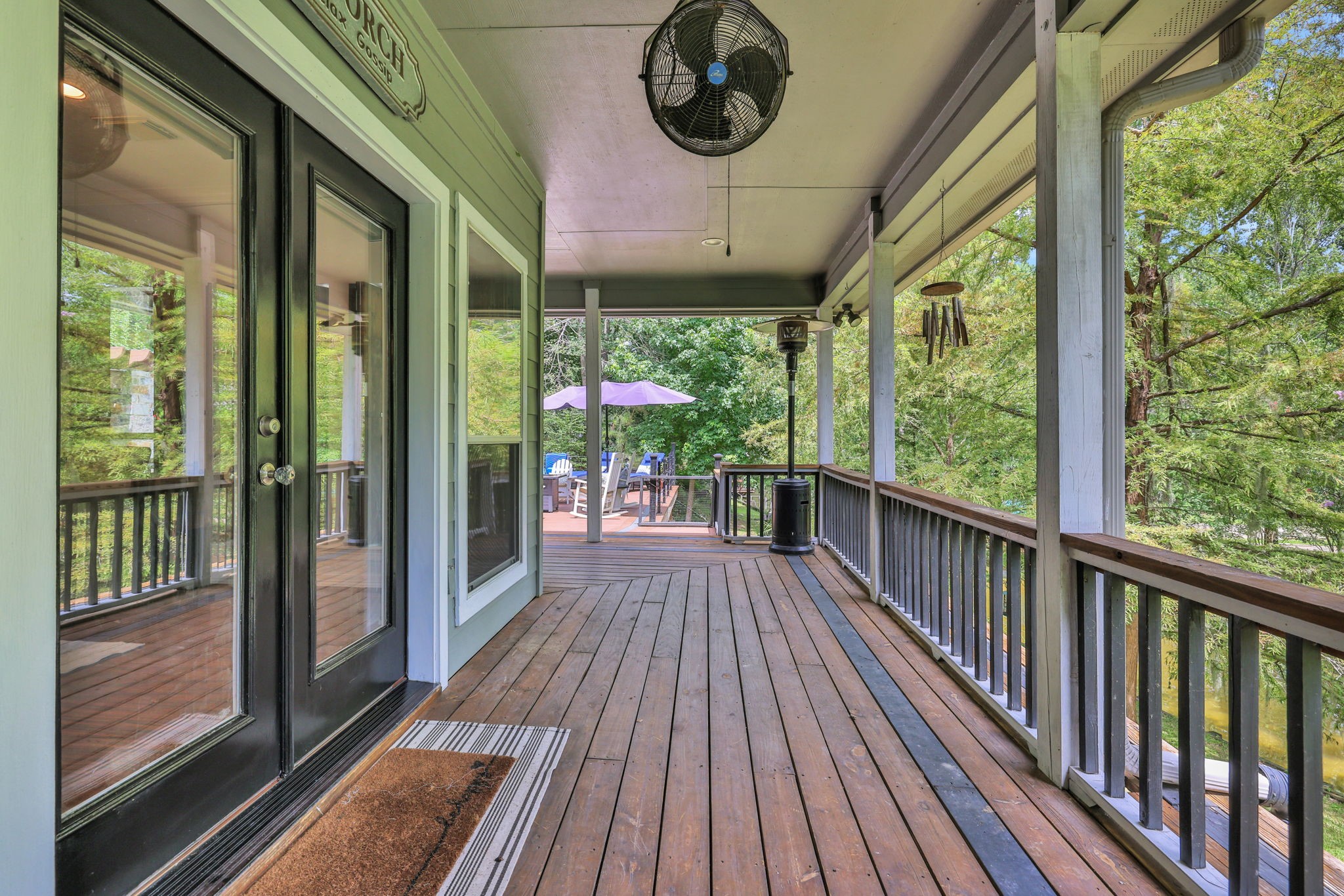 991 Kings Way Coldspring, TX 77331 - Photo 34 of 49 Step out of the living area onto the covered back deck