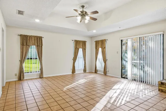 a view of a hallway view with staircase