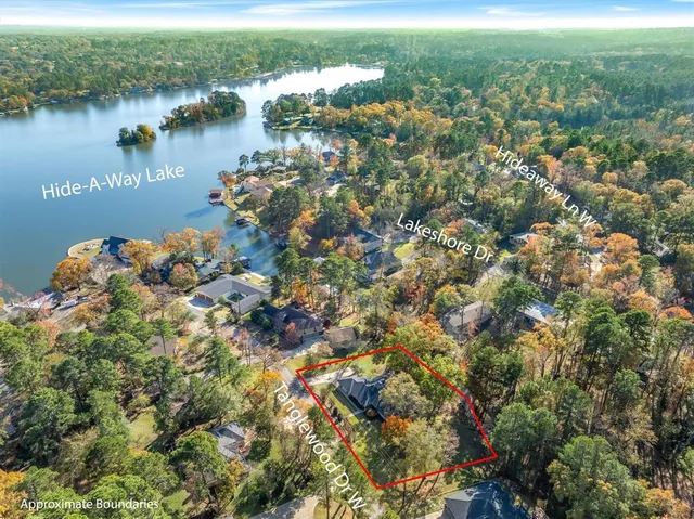a view of a house with a trees from a patio