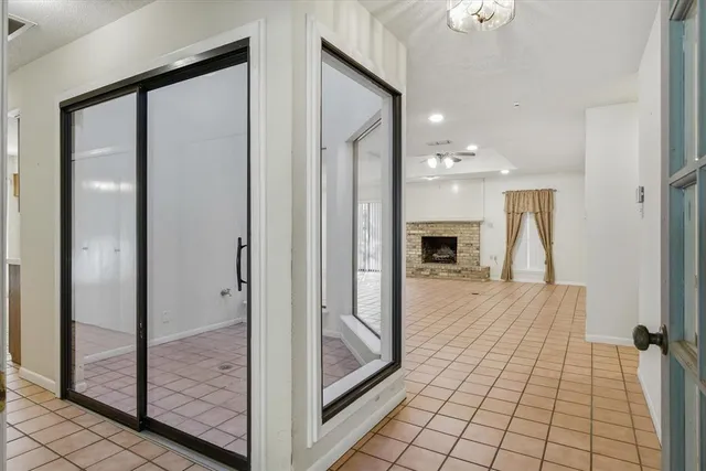 a bathroom with a shower and a sink