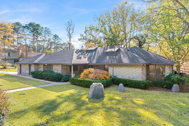 a view of an empty room with glass door