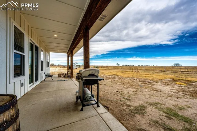 a view of a terrace with wooden floor and chair