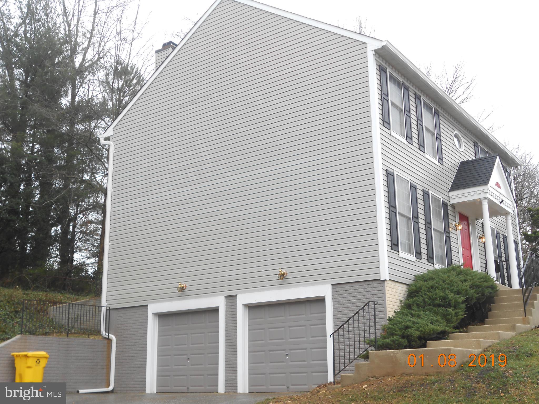 6207 Groveland Road Linthicum, MD 21090 - Photo 3 of 21 AUTO 2 CAR GARAGE & LEFT SIDE OF HOUSE