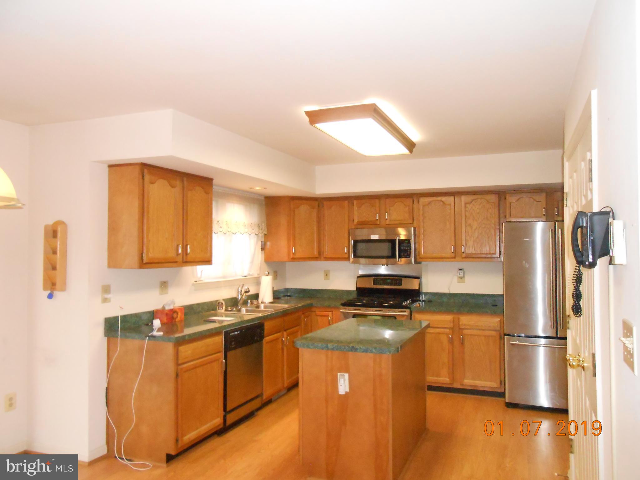 6207 Groveland Road Linthicum, MD 21090 - Photo 10 of 21 KITCHEN WITH BREAKFAST AREA