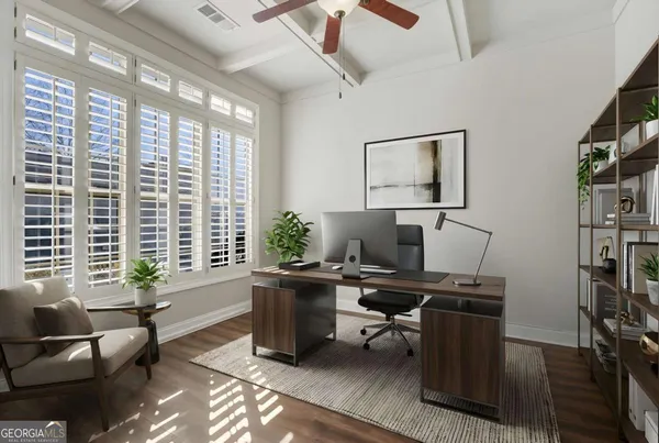 a workspace with furniture and a window