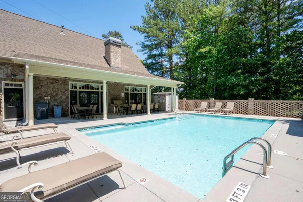 a view of a house with a swimming pool