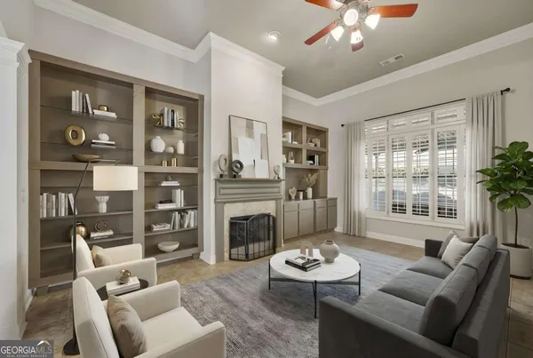 a living room with furniture and a fireplace