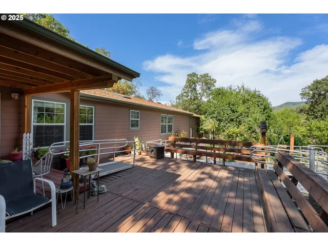 a view of a balcony with chairs