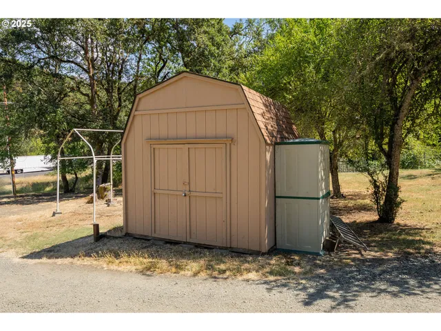 a view of a yard with an outdoor space