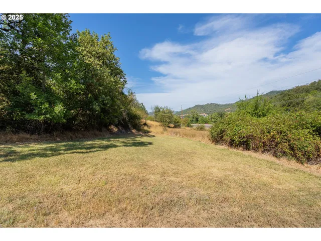 a aerial view of a house with a swimming pool