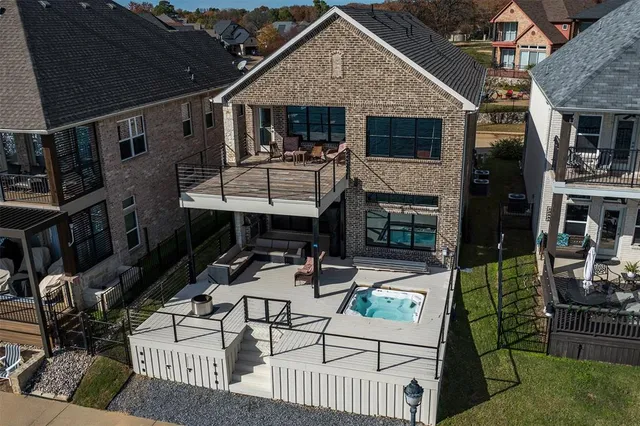 a view of house with backyard outdoor seating and green space