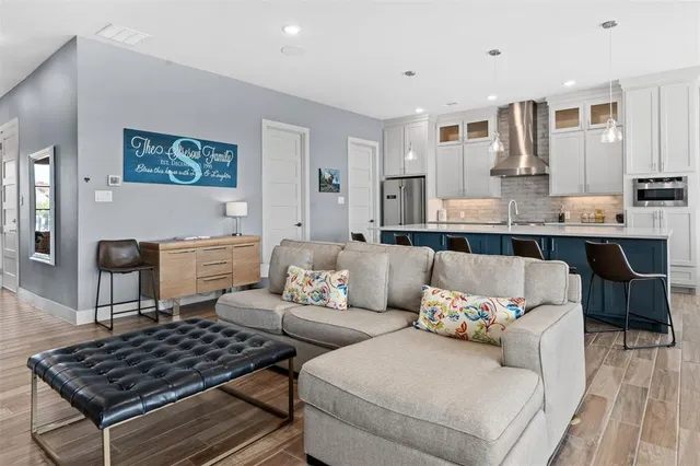 a living room with furniture and a table