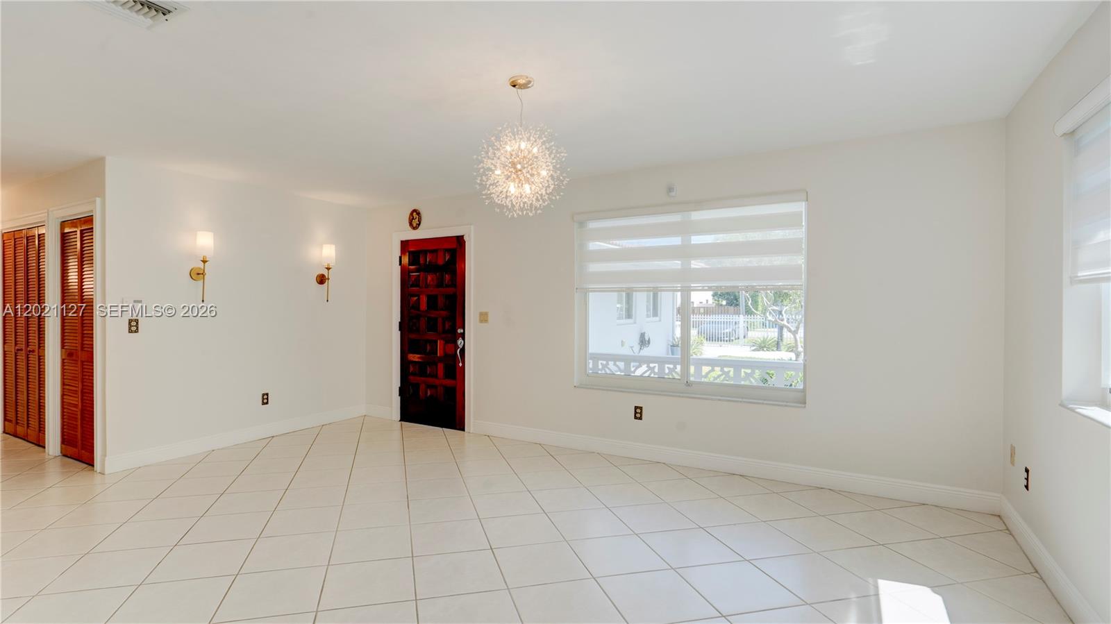 3611 Southwest 23rd Street Miami, FL 33145 - Photo 6 of 56 3613 - view to front entrance. hallway with AC and second large closet on left