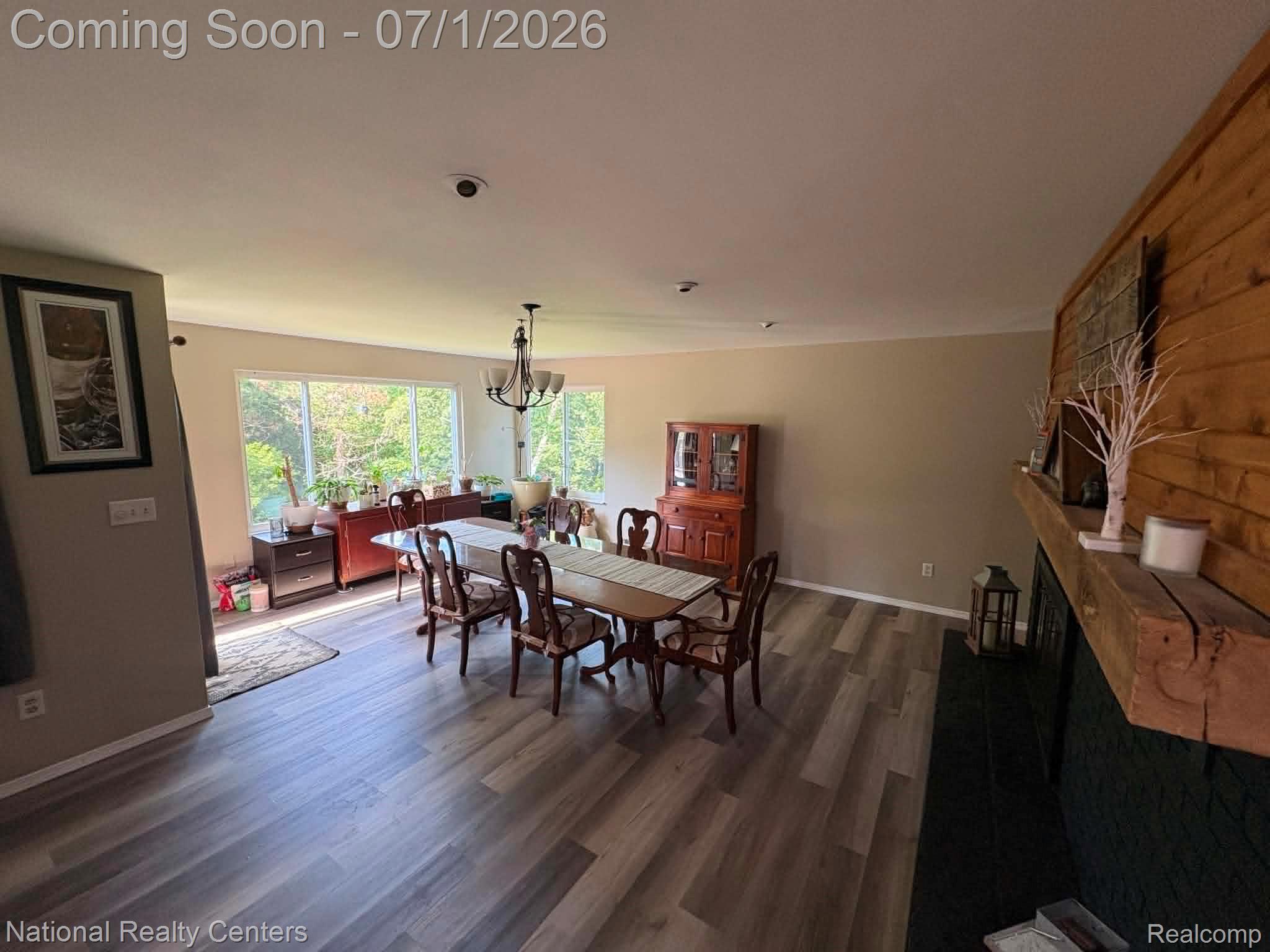 1330 Brauer Road Oxford, MI 48371 - Photo 34 of 54 Spacious room featuring wood-finish flooring and neutral wall tones