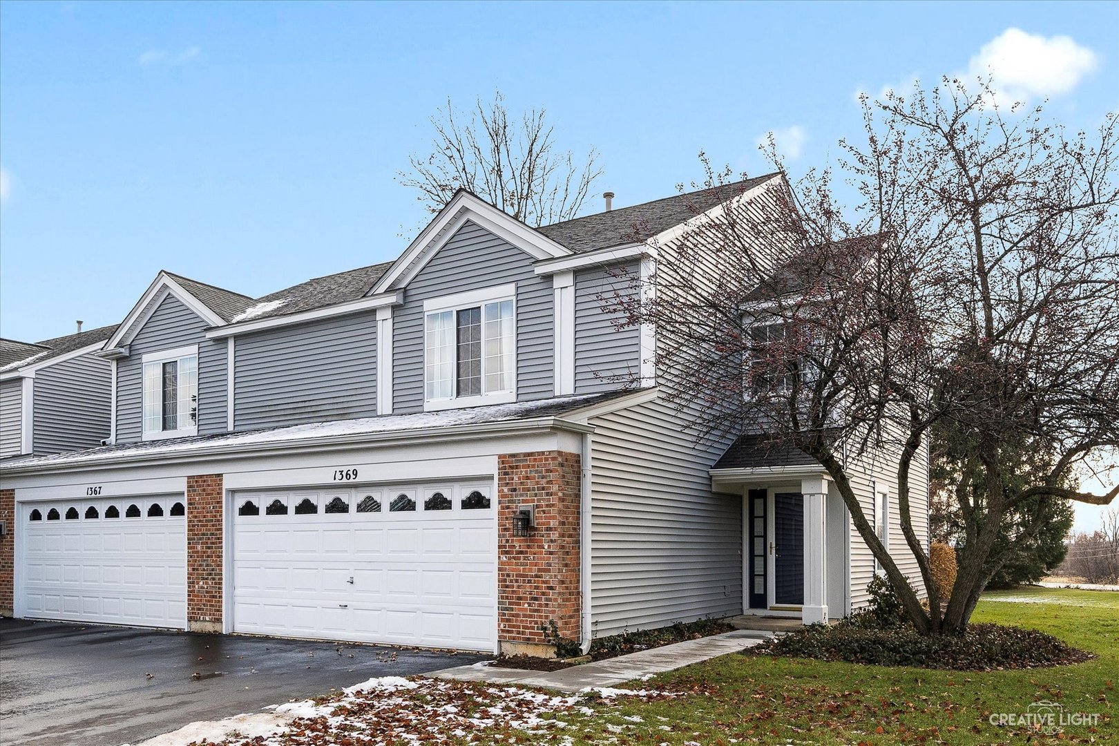 1369 Spaulding Road Bartlett, IL 60103 - Photo 1 of 15 a front view of a house